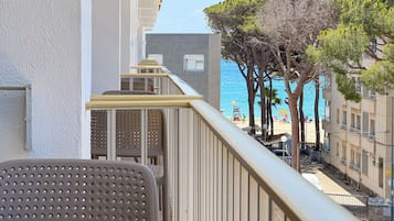 Standard Quadruple Room, Balcony, Courtyard View | In-room safe, blackout curtains, free WiFi, bed sheets
