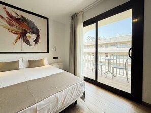 Standard Quadruple Room, Balcony, Courtyard View | In-room safe, blackout drapes, free WiFi, bed sheets
