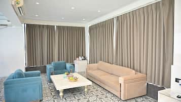 Presidential Suite | Living area | 24-inch LED TV with cable channels
