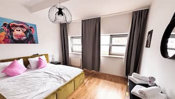 2 slaapkamers, een strijkplank/strijkijzer, reisbedje, gratis wifi