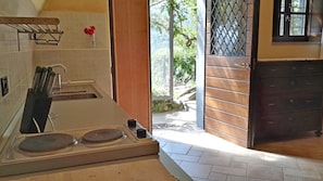 Fridge, microwave, coffee/tea maker, cookware/dishes/utensils