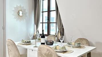 Comfort Apartment, Courtyard View | Living area | 107-cm Smart TV with digital channels
