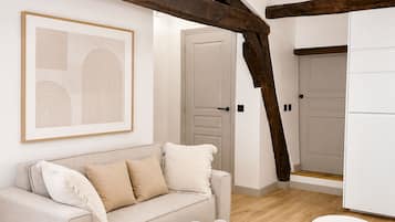 Comfort Apartment, Courtyard View | Living area | 107-cm Smart TV with digital channels