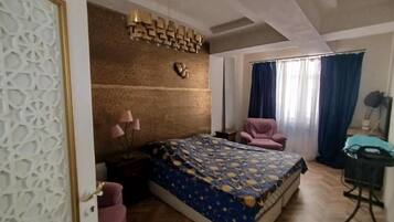 2 habitaciones, tabla de planchar con plancha, wifi y ropa de cama