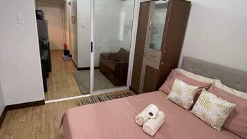 Condo, 1 Bedroom, Balcony, City View | Iron/ironing board, free WiFi, bed sheets