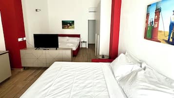 Monolocale Deluxe, 1 letto queen con divano letto, bagno privato | Area soggiorno