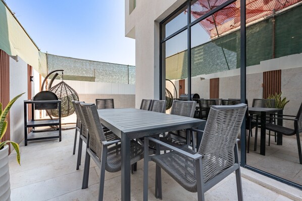 Outdoor dining - 4BR Plus Maids Villa with Dedicated Outdoor Pool, Near Clubhouse by Deluxe Holiday Homes (Dubai)