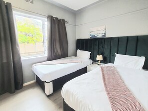 2 chambres, fer et planche à repasser, Wi-Fi, draps fournis