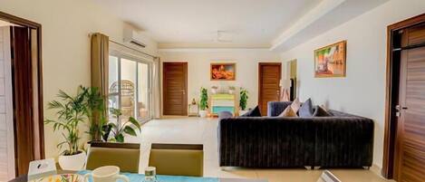 Chambre Deluxe, balcon, vue sur la montagne | Aire de séjour