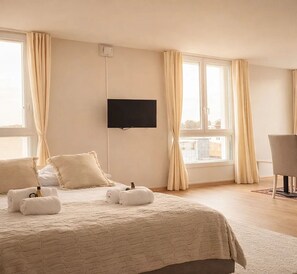 Appartement familial, vue sur la ville | Aire de séjour | Téléviseur connecté de 80 cm avec télévision numérique