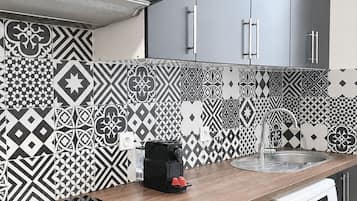 Family Apartment, City View | Private kitchen | Espresso maker, electric kettle, toaster, freezer