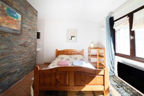 2 habitaciones, tabla de planchar con plancha, wifi y ropa de cama 