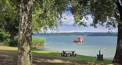 Gemütliche Haushälfte in Seenähe mit Grill, fußläufig zur Badestelle & Satama
