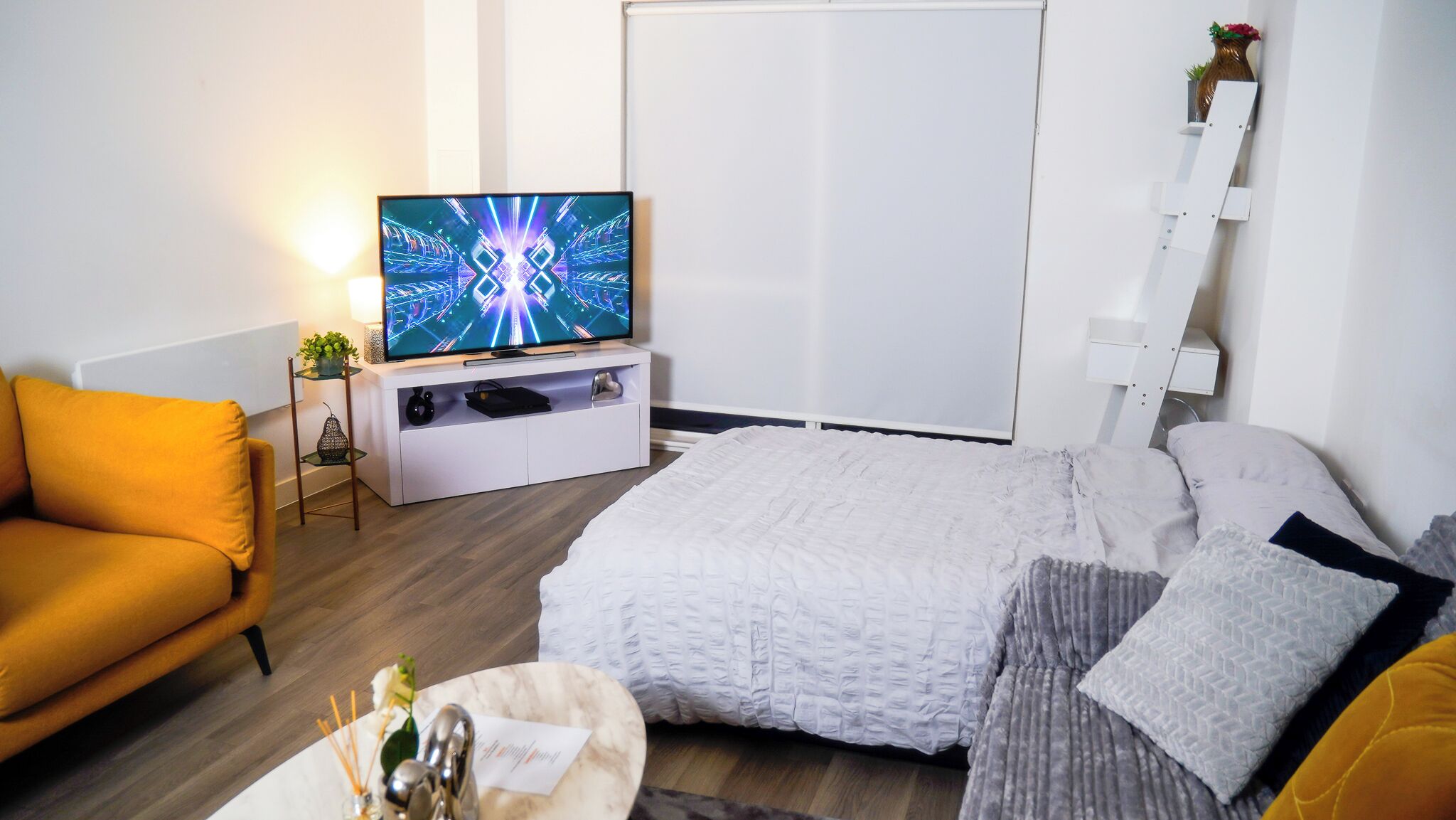 Apartment, Balcony, City View | Living area | Flat-screen TV