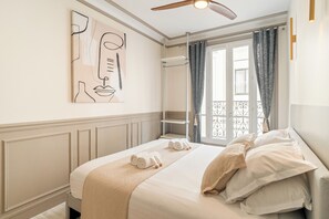 Iron/ironing board, travel crib, free WiFi, bed sheets