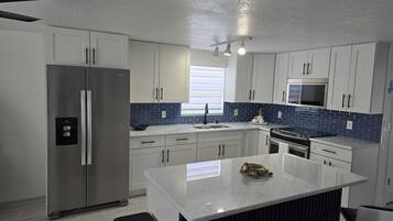 Microwave, stovetop, kitchen islands