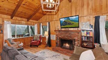 Cabin, Multiple Beds, Hot Tub, Mountain View (The Lazy Bear Cabin) | Living area | 42-inch flat-screen TV with digital channels, fireplace