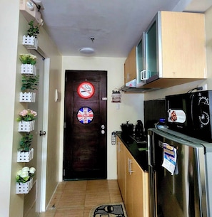 Condo, 1 Bedroom, Accessible | Private kitchen - Highland Hideaway in Baguio City (Baguio)