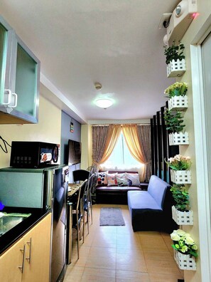 Condo, 1 Bedroom, Accessible | Living room - Highland Hideaway in Baguio City (Baguio)
