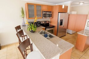 Fridge, microwave, stovetop, dishwasher - Spacious 3BR Apt in Rio Grande (Mameyes II)