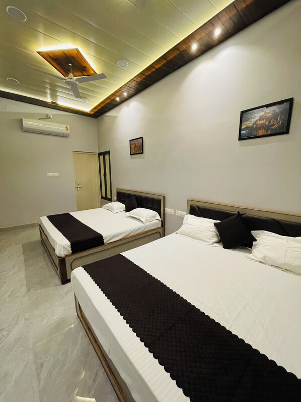 家庭房, 多张床, 空调 | 记忆海绵床垫、免费 WiFi