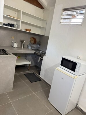 Een magnetron, een oven, een kookplaat