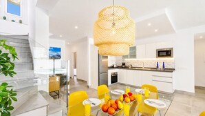 A modern kitchen with white cabinets, a microwave, and a sink. - Villa Maria 7 - Three Bedroom Villa, Sleeps 6 (Puerto Calero)