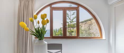 Departamento Premium, vista al mar | Área de sala de estar