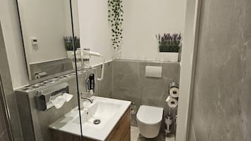 Shower, rainfall showerhead, hair dryer, heated floors
