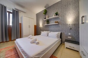 2 quartos, ferros/tábuas de passar roupa, berço de viagem, Wi-Fi