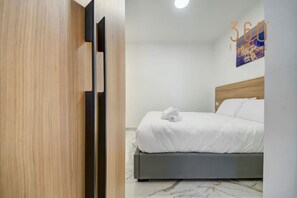 2 bedrooms, desk, iron/ironing board, travel crib