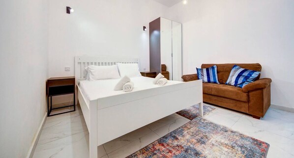 Desk, travel crib, WiFi, bed sheets
