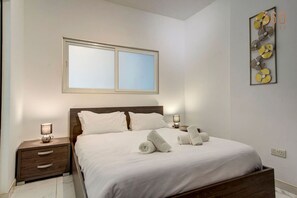 Desk, iron/ironing board, travel crib, WiFi