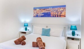 Iron/ironing board, travel crib, WiFi, bed sheets