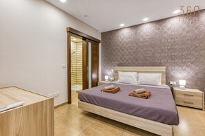 2 bedrooms, desk, iron/ironing board, travel crib