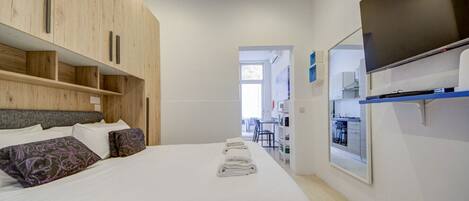 1 bedroom, desk, iron/ironing board, travel cot