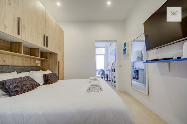 1 bedroom, desk, iron/ironing board, travel cot