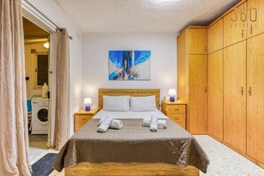 1 bedroom, desk, iron/ironing board, travel cot