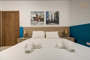 4 bedrooms, desk, iron/ironing board, travel cot