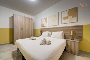 4 bedrooms, desk, iron/ironing board, travel cot
