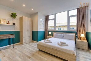 1 غرفة نوم ومكتب ومكواة/لوح كي وواي فاي