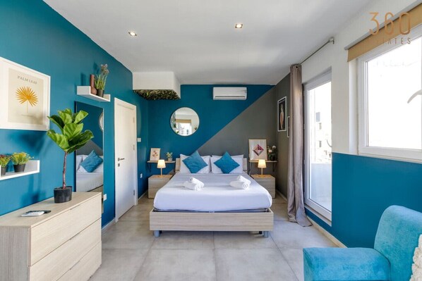 1 bedroom, desk, iron/ironing board, travel crib