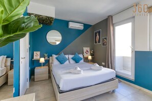 1 bedroom, desk, iron/ironing board, travel crib