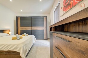 Desk, iron/ironing board, travel crib, WiFi