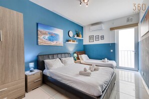 3 bedrooms, desk, iron/ironing board, travel cot