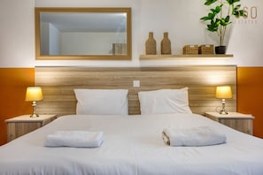 4 habitaciones, escritorio, tabla de planchar con plancha y wifi