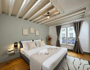 Appartement Signature, vue ville | Fer et planche à repasser, lit parapluie, Wi-Fi gratuit, draps fournis