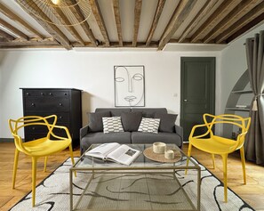 Signature Apartment, City View | Living area | 80-cm Smart TV with digital channels