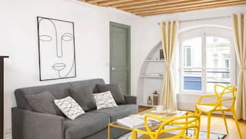 Appartement Signature, vue ville | Coin séjour