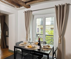 Signature Apartment, City View | Living area | 80-cm Smart TV with digital channels